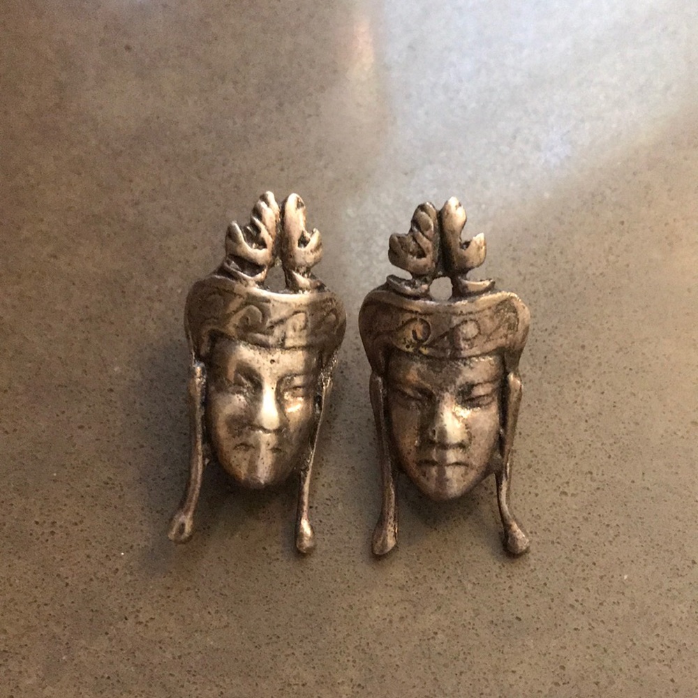 Vintage silver earrings with screw on backing.